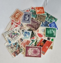 Worldwide Stamp accumulation, 1 oz around 450 off paper stamps .
