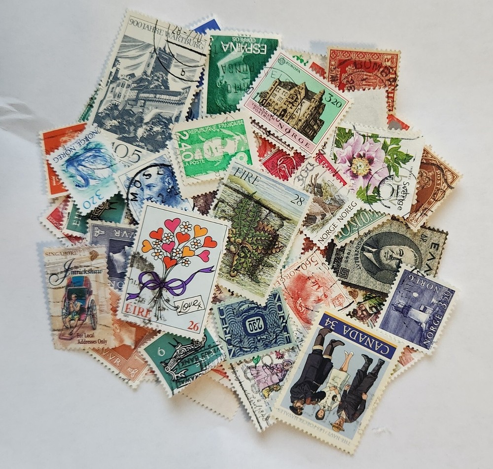 Worldwide Stamp accumulation, 1 oz around 450 off paper stamps .