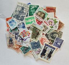 Worldwide Stamp accumulation, 1 oz around 450 off paper stamps .